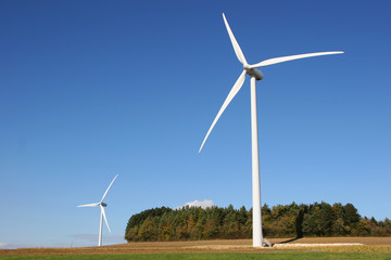 Fototapeta premium wind mill on blue sky during the autumn