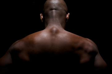 Close up of a worked out back of an African American Young.