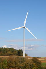 wind mill on blue sky during the autumn
