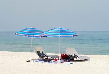 Empty beach chairs on a Florida beach