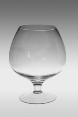 wide glass on gray gradient background