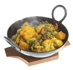 Indian vegetable curry with cauliflower, spinach and potatoes © Joe Gough