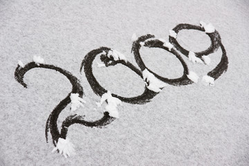 ice on surfaces lake coated by snow with written numeral 2009