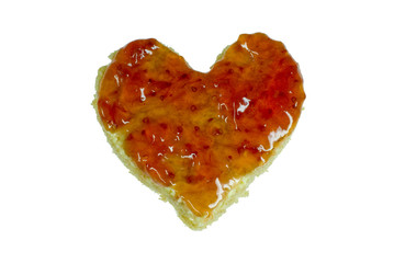 A slice of a jely sandwich in heart shape