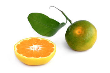 Tangerine and a half on white background