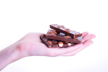 Chocolate with nuts on hand