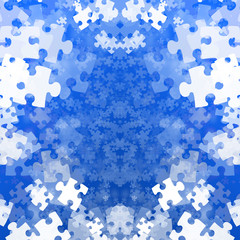 Random jigsaw pieces on a soft blue background