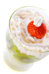 Cottage cheese in  glass with cream and berries