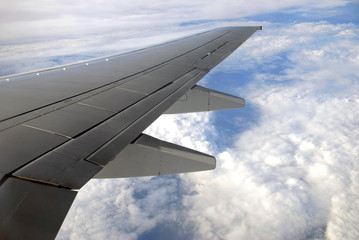 Fototapeta premium Image of a wing plane in sky.
