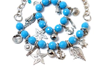 Necklace light-blue color  on white background.