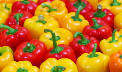 Background from juicy red and yellow pepper