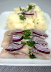 Marinated herring fillets with mashed potatoes