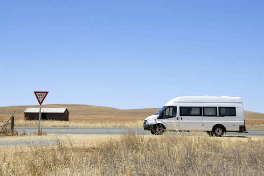 Camper Van On Its Way In The Desert In Australia