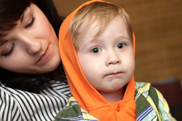 Portrait of mother with son at home