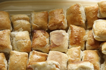 freshly backed sausage rolls for a buffet