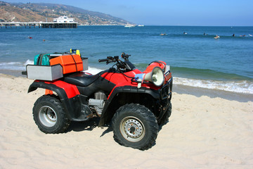 Lifeguard's car on the beach ready for rescue