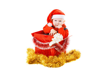infant with gifts in the decorated christmas box