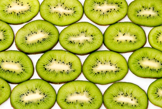 Slices of kiwi fruits isolated on white background