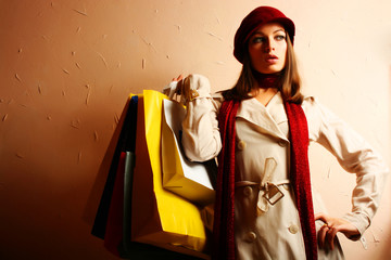 Portrait of young beautiful women with her shopping bags - 10114132