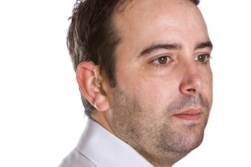 Fototapeta premium Hearing Aid on Deaf Male. Focus on Hearing Aid
