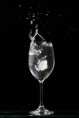 alcohol splash on black  background