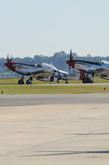 various images from the air show on a beautiful day