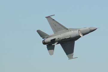 various images from the air show on a beautiful day