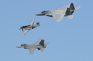 various images from the air show on a beautiful day