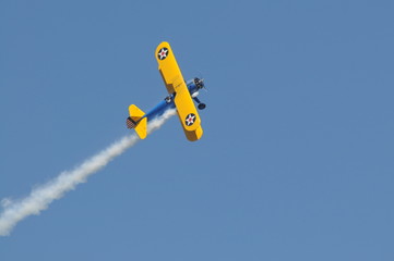 various images from the air show on a beautiful day