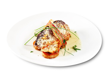 Fillet of Trout Wrap in Bacon with Greens and Sauce