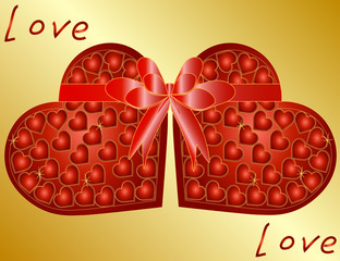 Two red hearts connected by a bow on a gold background