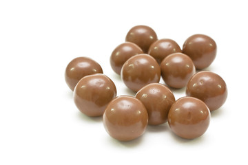 Round bonbons isolated on white.
