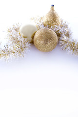 Fototapeta na wymiar beautiful gold seasonal Christmas decorations on white