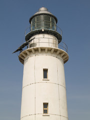 old lighthouse with blue sky
