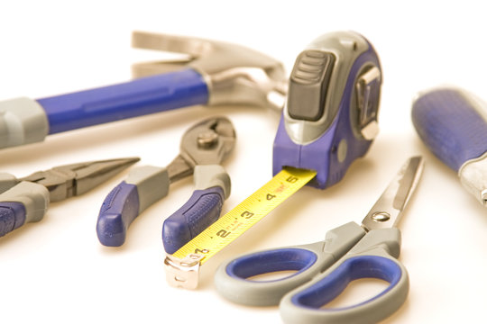 Tools focus on tape measure hammer background