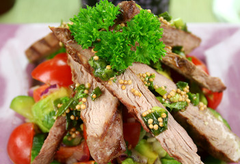 Lamb fillet with tomato, cucumber and avocado salsa