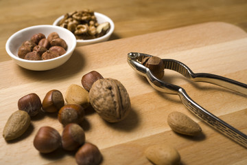 hazelnuts, walnuts, almonds and nutcracker