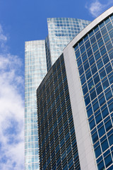 Obraz premium Modern glass architecture, perspective view from below.