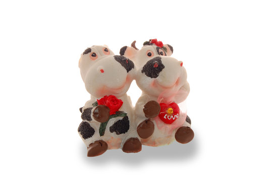 Toy cow and bull isolated on a white