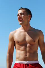 sexy strong man outdoors