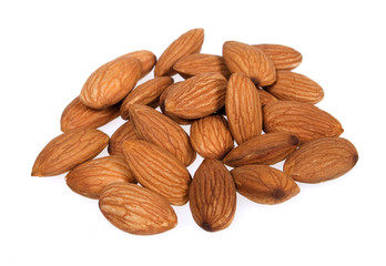 Pile of almonds isolated on white background
