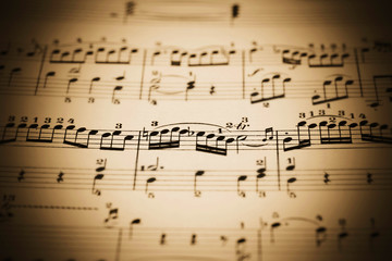 close-up of an old music sheet, very shallow DOF!