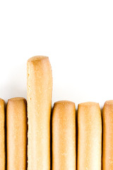 Breadstick tops on white background.