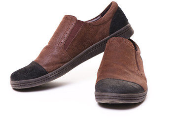 brown shoes over white background