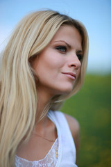 Naklejka premium Beautiful blond girl with long hair