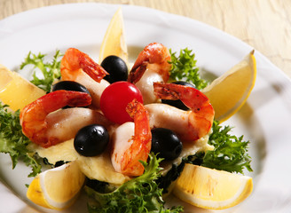 Prepared shrimp seafood with lemon and olive