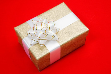 Two beautiful gift on a over red background