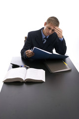 young businessman at work, isolated over white