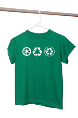 A green t-shirt on a hanger with recycle symbols