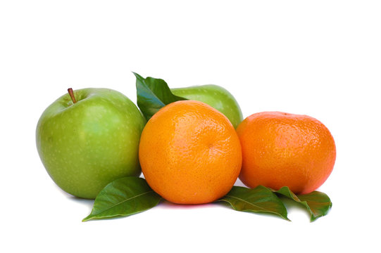 fresh apples and   oranges over white background
